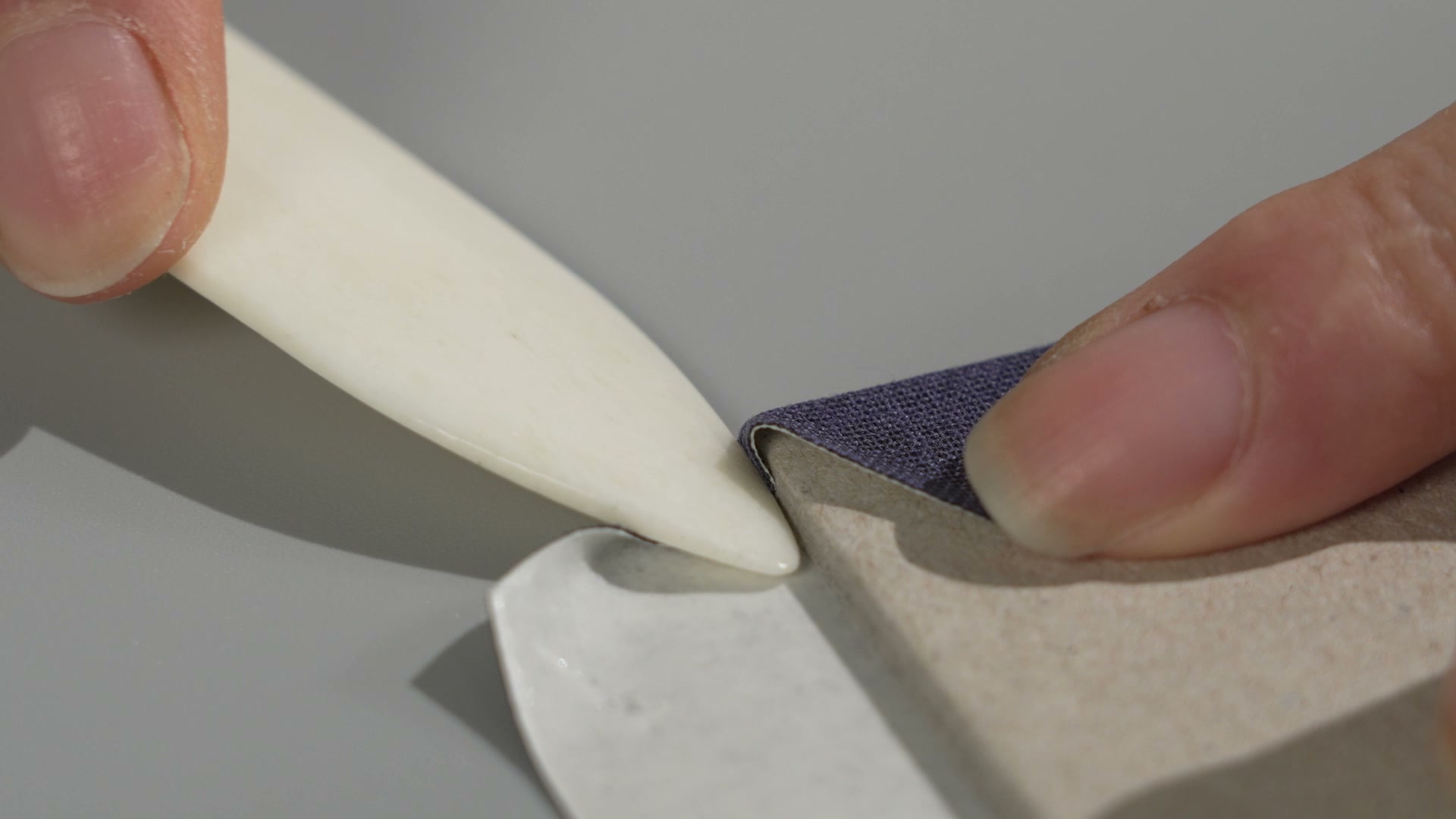 Hand binding and finishing work in the Rospins workshop